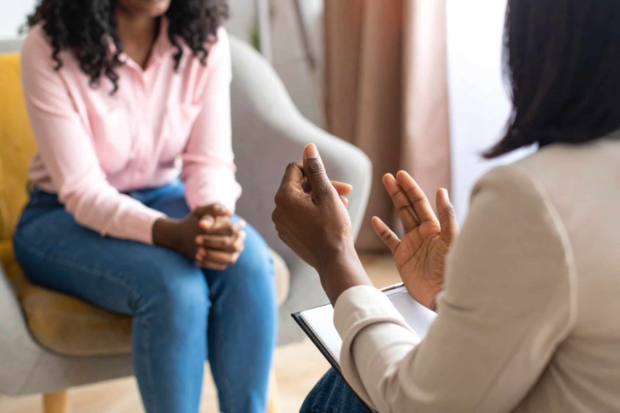 Firefly_A modern, natural-light photo of a psychological supervision session between two Blac 917784